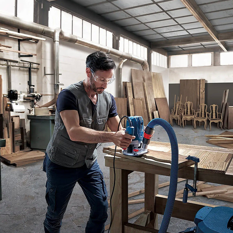 Máy phay Bosch GOF 130 công suất 1300W, chấu bóp 6mm - 8mm mã số 06016B70K1