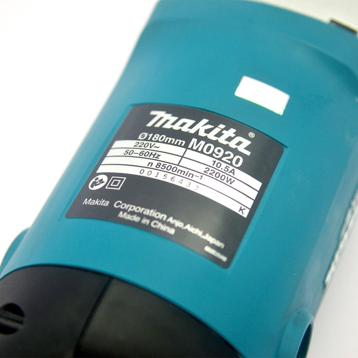 Máy mài góc Makita M0920B công suất 2,200W, đường kính lưỡi 180mm, công tắc bóp