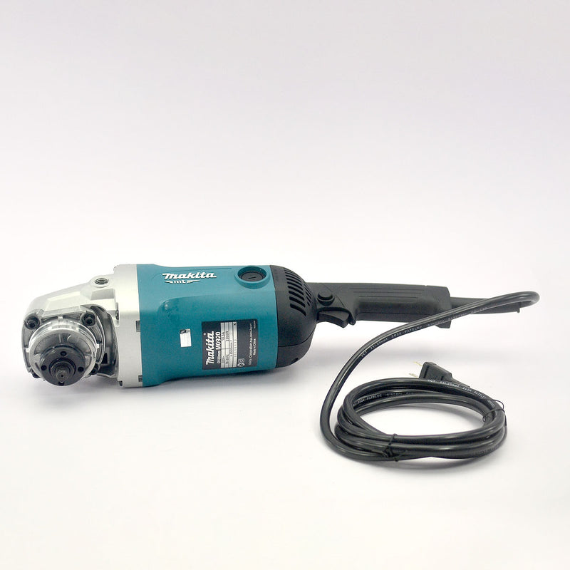 Máy mài góc Makita M0920B công suất 2,200W, đường kính lưỡi 180mm, công tắc bóp